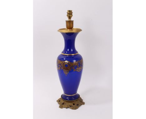 Good quality 19th century French porcelain vase with gilt scroll decoration on blue ground, with ormolu mounts - converted to