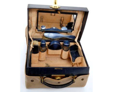 1920s leather travelling vanity case with silver and blue guilloche enamel fittings - including two hairbrushes, two toilet j