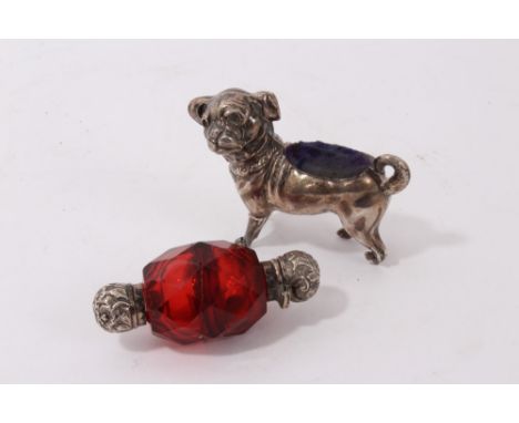 Edwardian silver novelty pin cushion, maker's mark rubbed, Birmingham 1905, in the form of a pug dog, 7cm long, together with