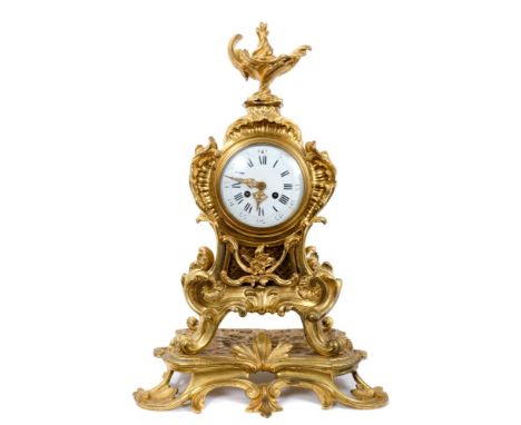 Good quality 19th century French Louis XV revival ormolu mantel clock in ornate rococo scroll and shell decorated case and st