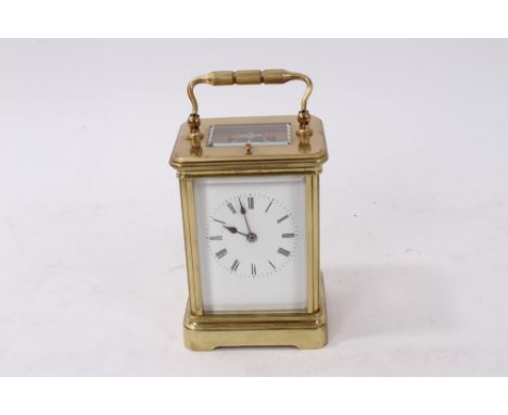 Late 19th century repeating carriage clock in brass case with white enamel dial, eight day movement striking on a bell, 16cm 