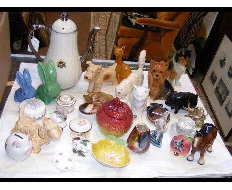 Sylvac dogs, Royal Doulton cats, together with other collectable ceramic ware 