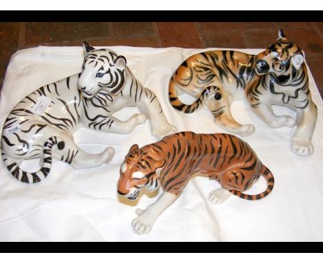 A large USSR ceramic Tiger, together with two others 