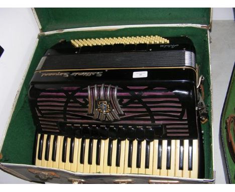 A Sottimio piano accordion in carrying case CONDITION REPORTseems to work ok