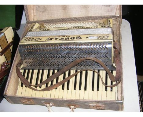 A Soprani Paolo piano accordion in carrying case 