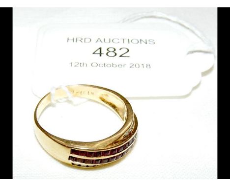 An 18ct gold ruby and diamond ring 