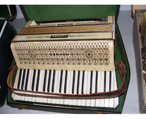 A Hohner Verdi III piano accordion in carrying case 
