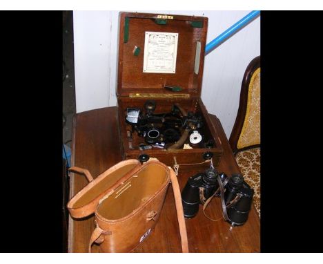 A Kelvin & Hughes sextant in carrying case, together with a pair of binoculars CONDITION REPORTbinoculars make DOLLAND LONDON