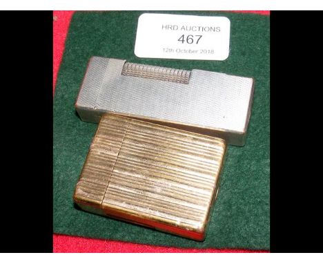 A DuPont lighter and one other 