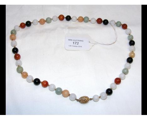 A multi-coloured jade necklace with decorative clasp 