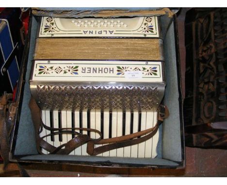 A Hohner Alpina piano accordion 