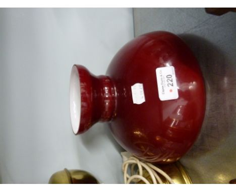 BRASS OIL LAMP PATTERN ELECTRIC TABLE LAMP WITH RED GLASS SHADE 