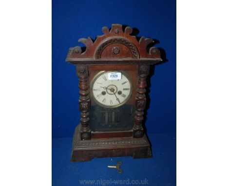 A wooden cased Junchans Bracket Clock with glass door, pendulum and key. 