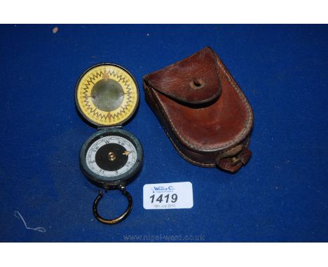 A leather cased Compass