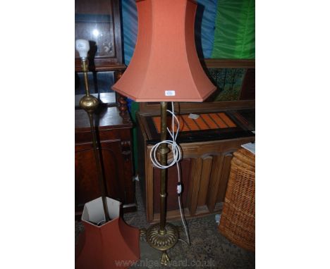 A Brass base column Standard Lamp on three paw feet with terracotta hexagonal lamp shade.