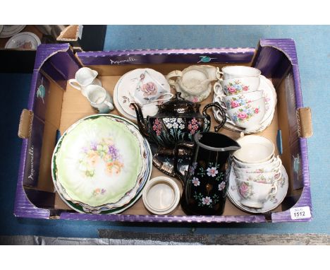 A box of china including black Teapot and stand, part Teaset, Oxford Marmalade Jar, etc.