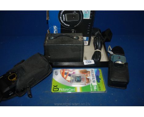 An Olympus Mju  410  4.0 mega pixel Digital Compact Camera, with battery, charger, 2 XD memory cards and leather case, all bo