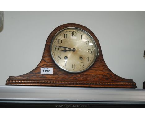 A wooden cased Napoleon Hat Mantle Clock with key, face a/f.