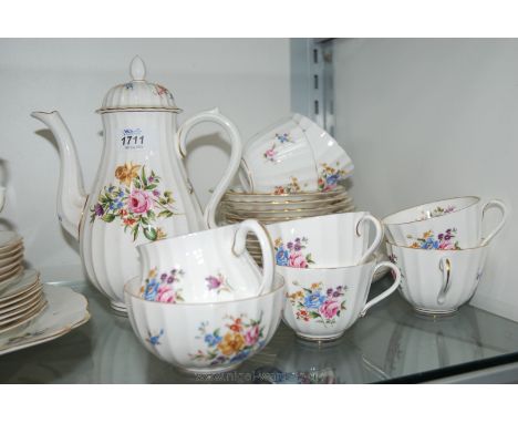 A Royal Worcester Coffee/Tea service in ''Roanake'' pattern including Coffee Pot, Bread/Butter Plate, six cups and seven sauc