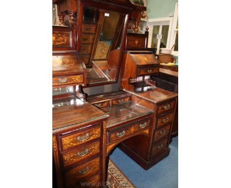 An elegant late 19th c. Rosewood and Mahogany Kneehole Dressing Chest (matching wardrobe), having rectangular bevel plated mi