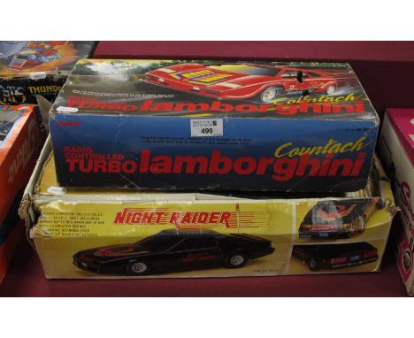 A made in Taiwan battery operated Super Night Raider (imitation Knight Rider) electronic toy car. Together with a Tandy #60-4