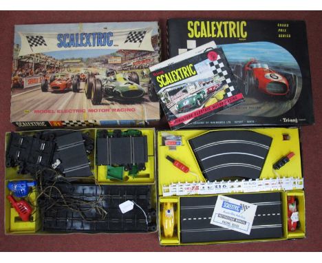 A 1960s Scalextric G.P.2 set containing two Vanwall cars, one yellow, one red. Although signs of use in overall very good con