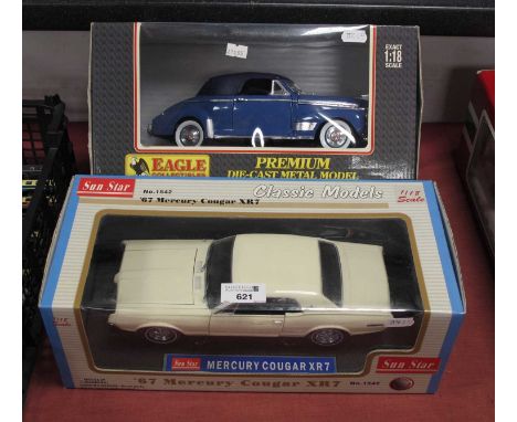 Two Boxed 1:18th Scale American Outline Diecast Model Vehicles comprising of Sun Star #1542 '67 Mercury Cougar XR7 (wing mirr