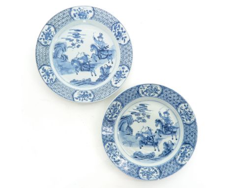 Depicting Chinese hunters on horseback, floral border decor, marked with double ring and conch shell, 23 cm. in diameter, chi