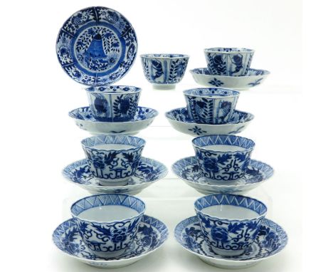 Including 8 cups and 8 saucers, blue and white decor, saucers are 13 cm. in diameter, some with chip and hairline.