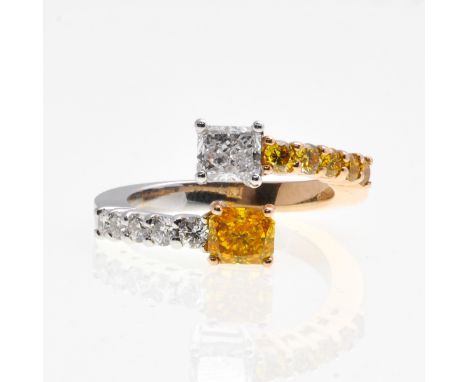 Two nice princess cut diamonds, each diamond is approximately 4.6 x 5.2 mm.  Ring size 18.
