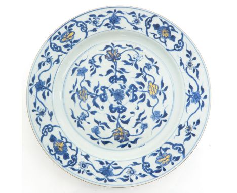Floral decor with gilt accents, 18th century, marked with double ring, 39 cm. in diameter, small chips on edge.