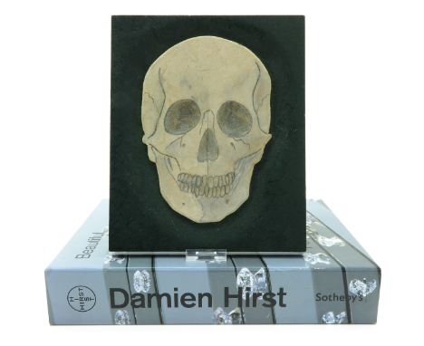 Also includes art work depicting skull.