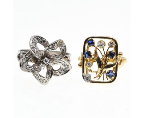 One also set with sapphires, largest ring size is 19.