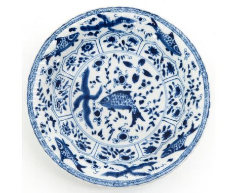 Decorated with floral and sea creatures, marked with double ring and symbol, 17 cm. in diameter, hairline on edge approx. 2 c
