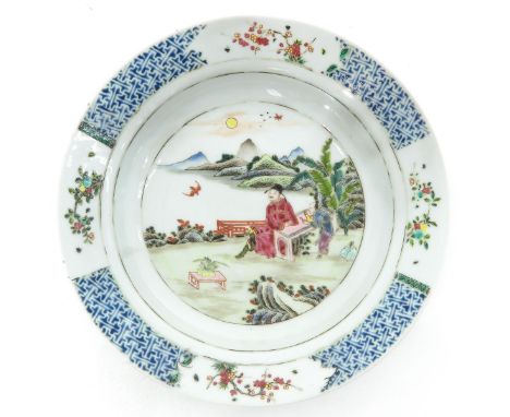 Depicting Chinese man in garden with landscape background, marked with double ring and censer, 22 cm. in diameter. 