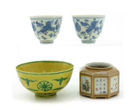 Including yellow ground bowl with green decor marked Daoguang, two blue and white floral decor cups, and a cafe au lait decor