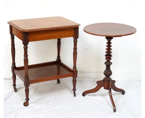 MAHOGANY TEA TROLLEYthe moulded top having canted corners above a concealed frieze drawer, standing on turned supports with c