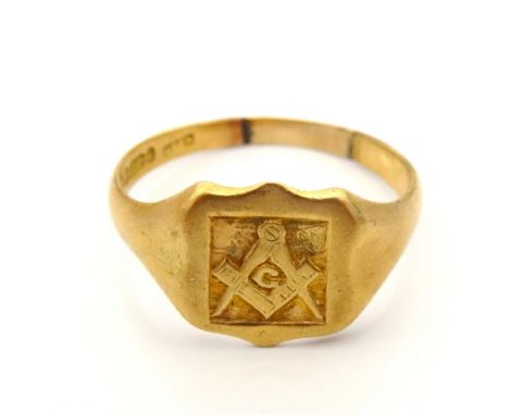 MASONIC NINE CARAT GOLD RINGwith compass decoration, approximately 4 grams, ring size V-W