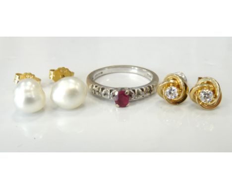 RUBY AND DIAMOND RINGon eighteen carat white gold shank, ring size H; together with a pair of pearl stud earrings in eighteen