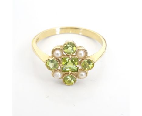 PERIDOT AND PEARL CLUSTER RINGon nine carat gold shank, ring size O