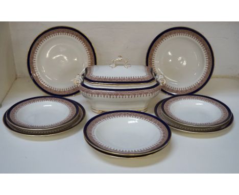 ROYAL WORCESTER DINNER SERVICEwith a white ground and gilt rim with a navy blue band around a brown transfer decorated band, 