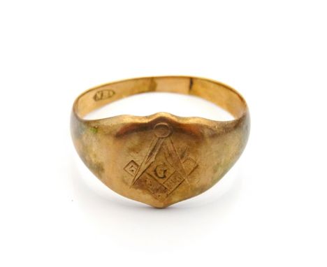 MASONIC NINE CARAT GOLD RINGwith engraved compass decoration, approximately 4.8 grams, ring size U