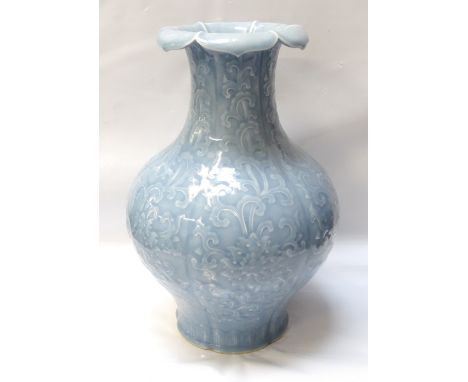 CHINESE PORCELAIN CLAIR-DE-LUNE GLAZED PORCELAIN VASEthe bottle shaped vase with flared lotus petal rim, with moulded floral 