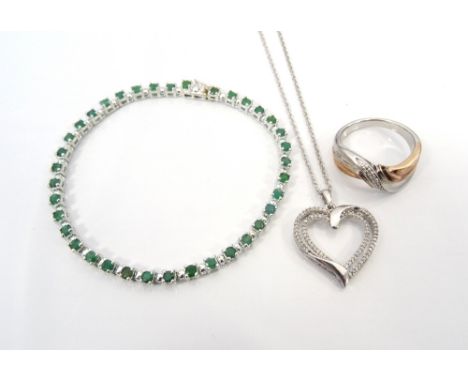 SELECTION OF GEM SET SILVER JEWELLERYcomprising an emerald line bracelet, a diamond set pendant on chain, and a diamond set d