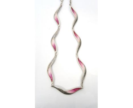 SHEILA FLEET SILVER AND ENAMEL 'FLIGHT' NECKLETeach of the stylised links with graduated pink enamel decoration