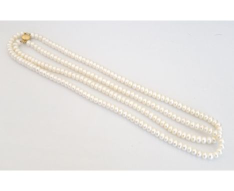 DOUBLE STRAND PEARL NECKLACEwith nine carat gold clasp, approximately 44cm long