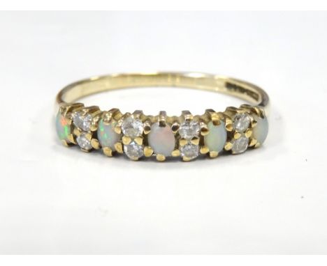 OPAL AND DIAMOND RINGwith alternating opals and diamond, on nine carat gold shank