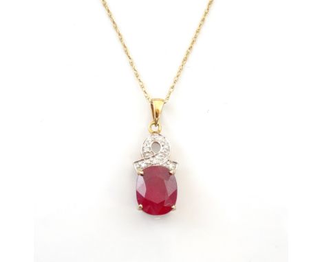 RUBY AND DIAMOND DROP PENDANTthe oval cut ruby approximately 4cts below diamonds in shaped settings, in nine carat gold and o