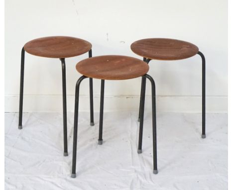 THREE MATCHING 1960s TEAK TOP STOOLSraised on metal tubular tripod support frames, 44.5cm high and the tops 31cm diameter