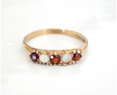 OPAL AND GARNET FIVE STONE RINGon nine carat gold shank, ring size R